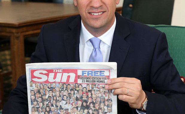 Labour leader Ed Miliband with a copy of The Sun newspaper Labour leader Ed Miliband with a copy of The Sun newspaper